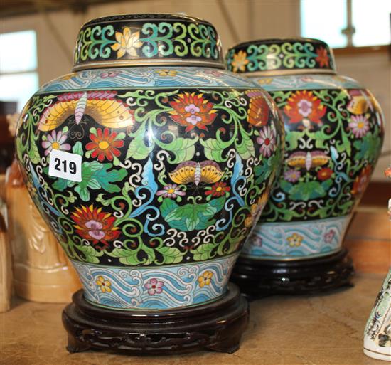 Pair of Chinese cloisonne enamelled jars and covers, 20th century, 26cm, wood stands(-)